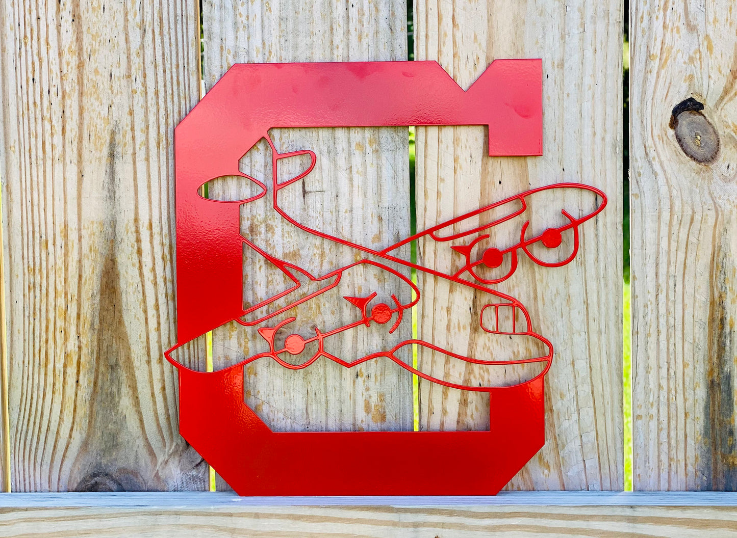 columbiana clippers red metal sign on fence